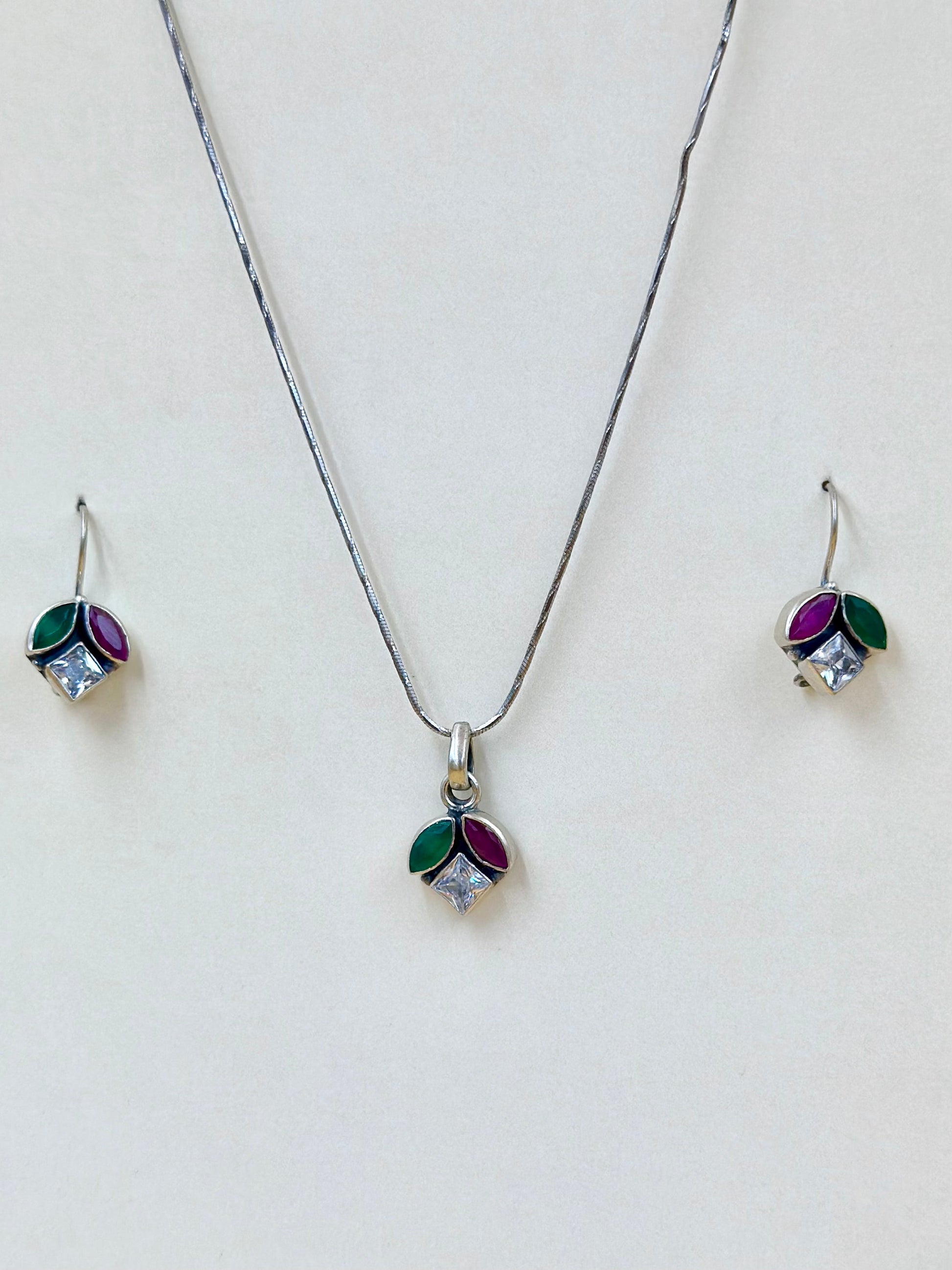 Zircon studded with fancy stones sterling silver pendant set