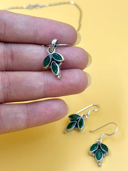 Stone studded, leaf shaped sterling silver pendant set