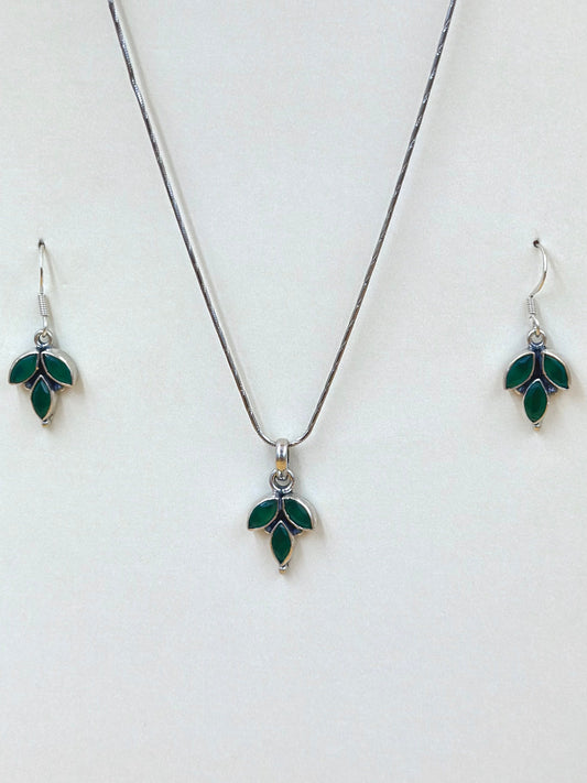 Stone studded, leaf shaped sterling silver pendant set