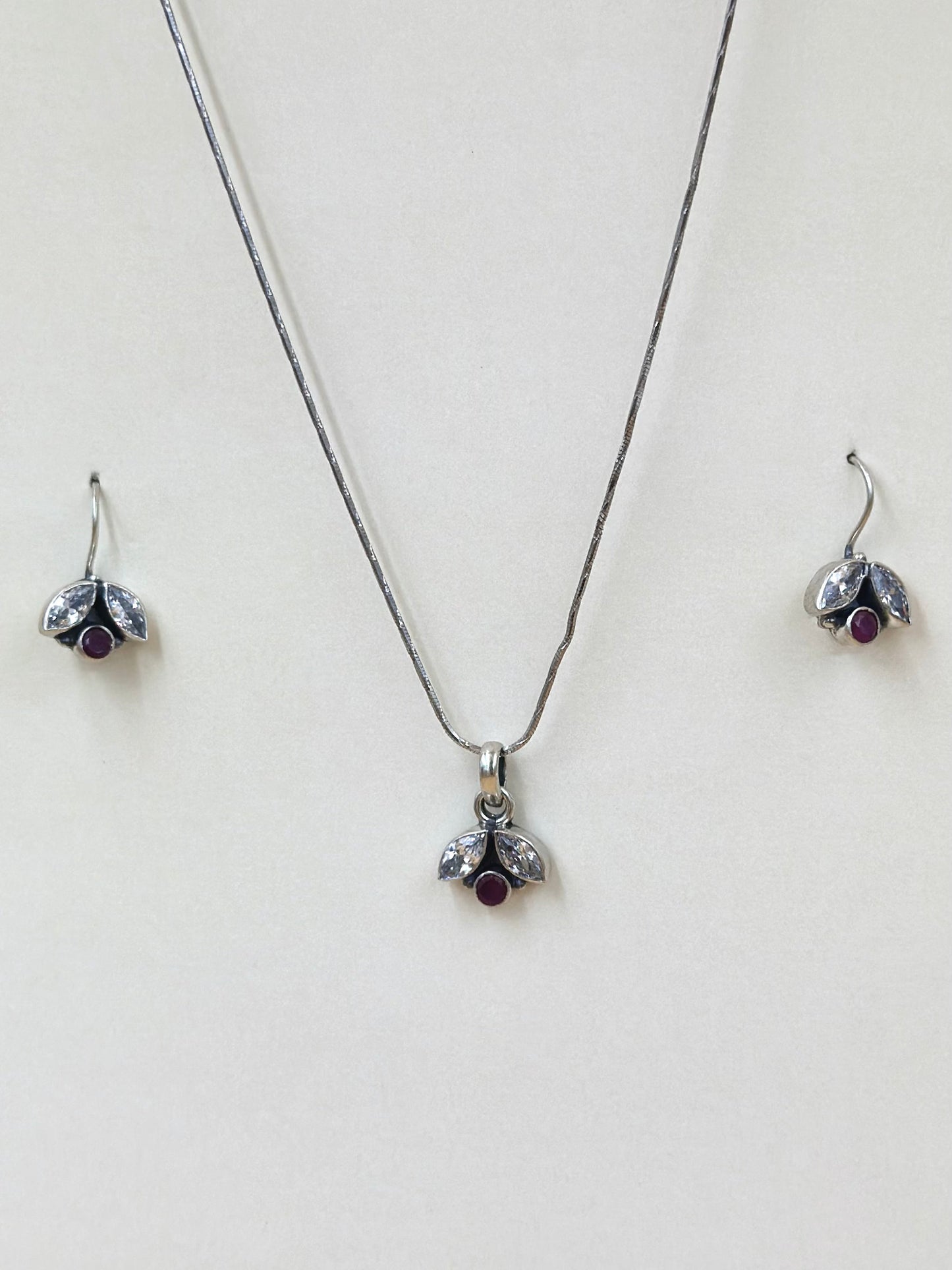Zircon and stone studded, leaf shaped sterling silver pendant set