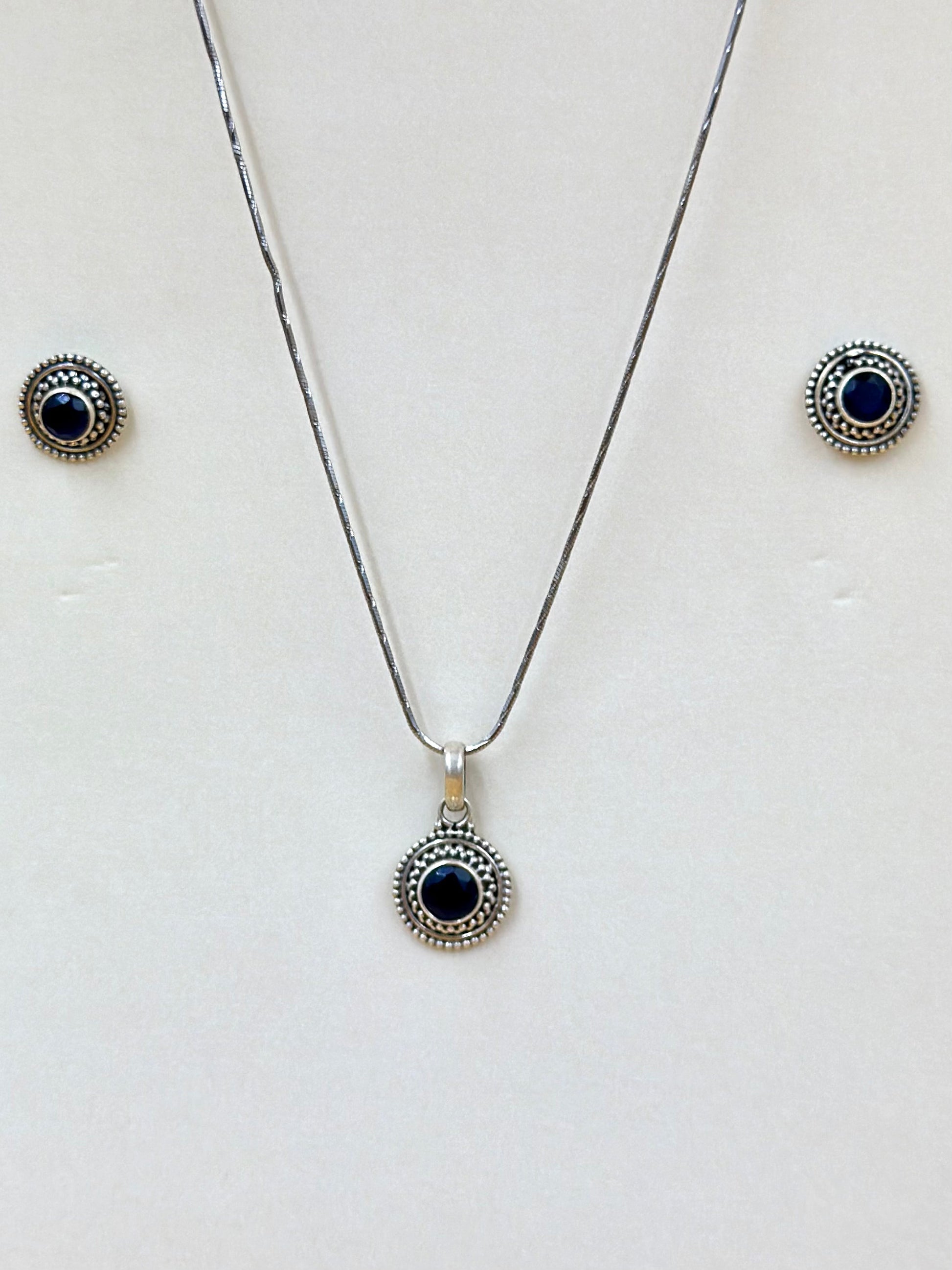 Stone studded, oxidised sterling silver pendant set