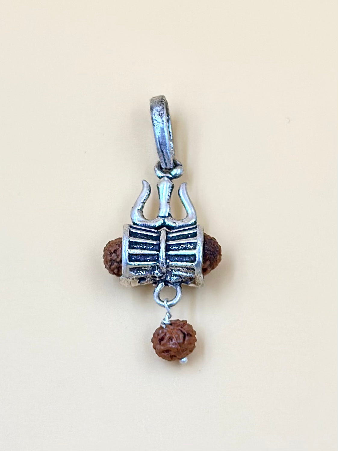 Oxidised, trishul shaped sterling silver idol pendant