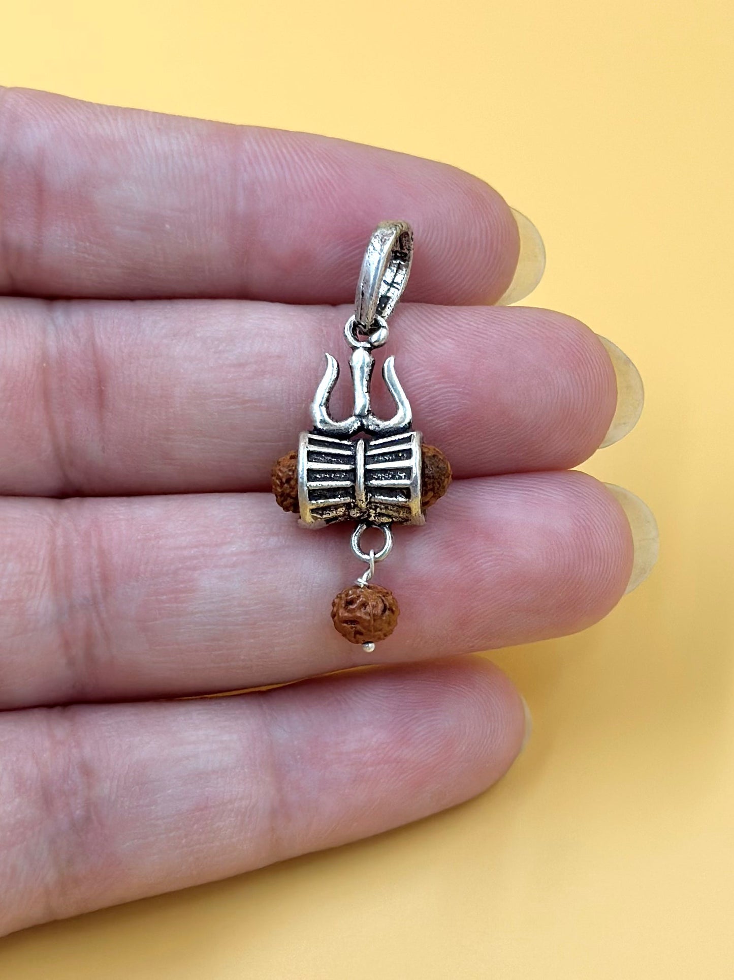 Oxidised, trishul shaped sterling silver idol pendant