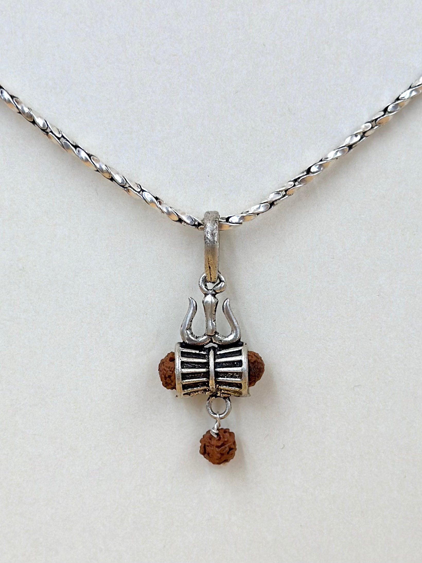 Oxidised, trishul shaped sterling silver idol pendant