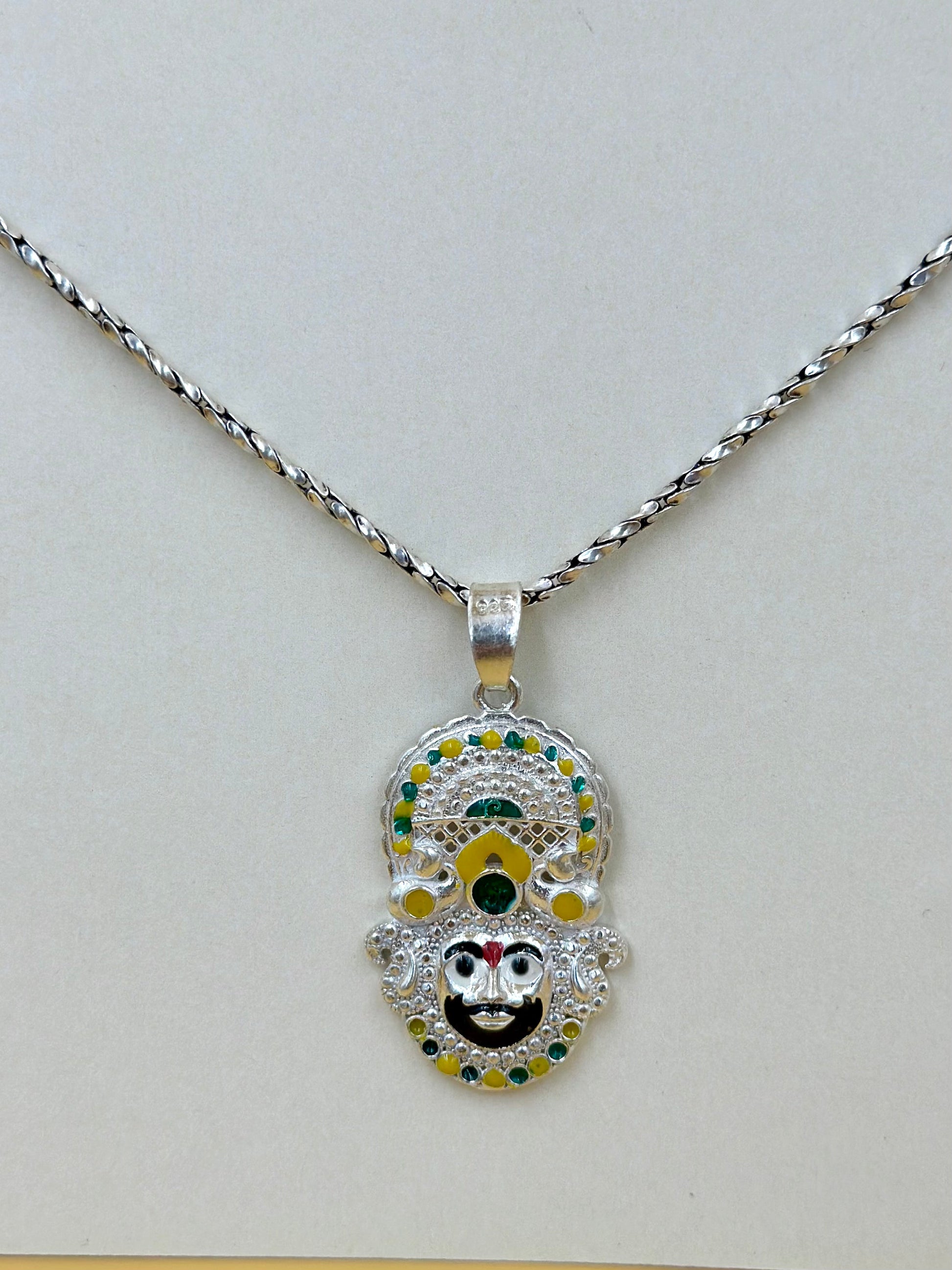 Zircon studded with fine detailing, shyam baba sterling silver idol pendant
