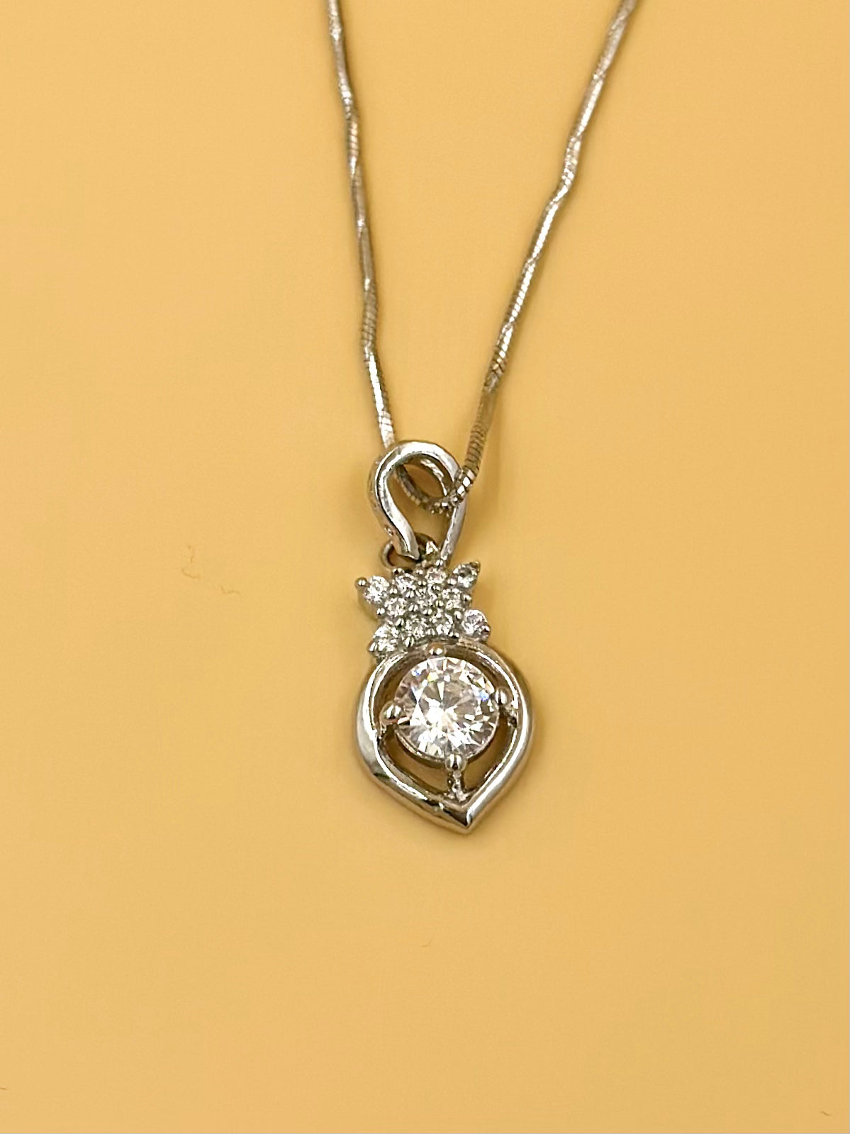 Zircon studded sterling silver pendant