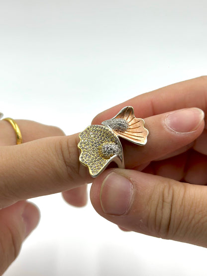 Zircon studded, wings shaped sterling silver cocktail ring 
