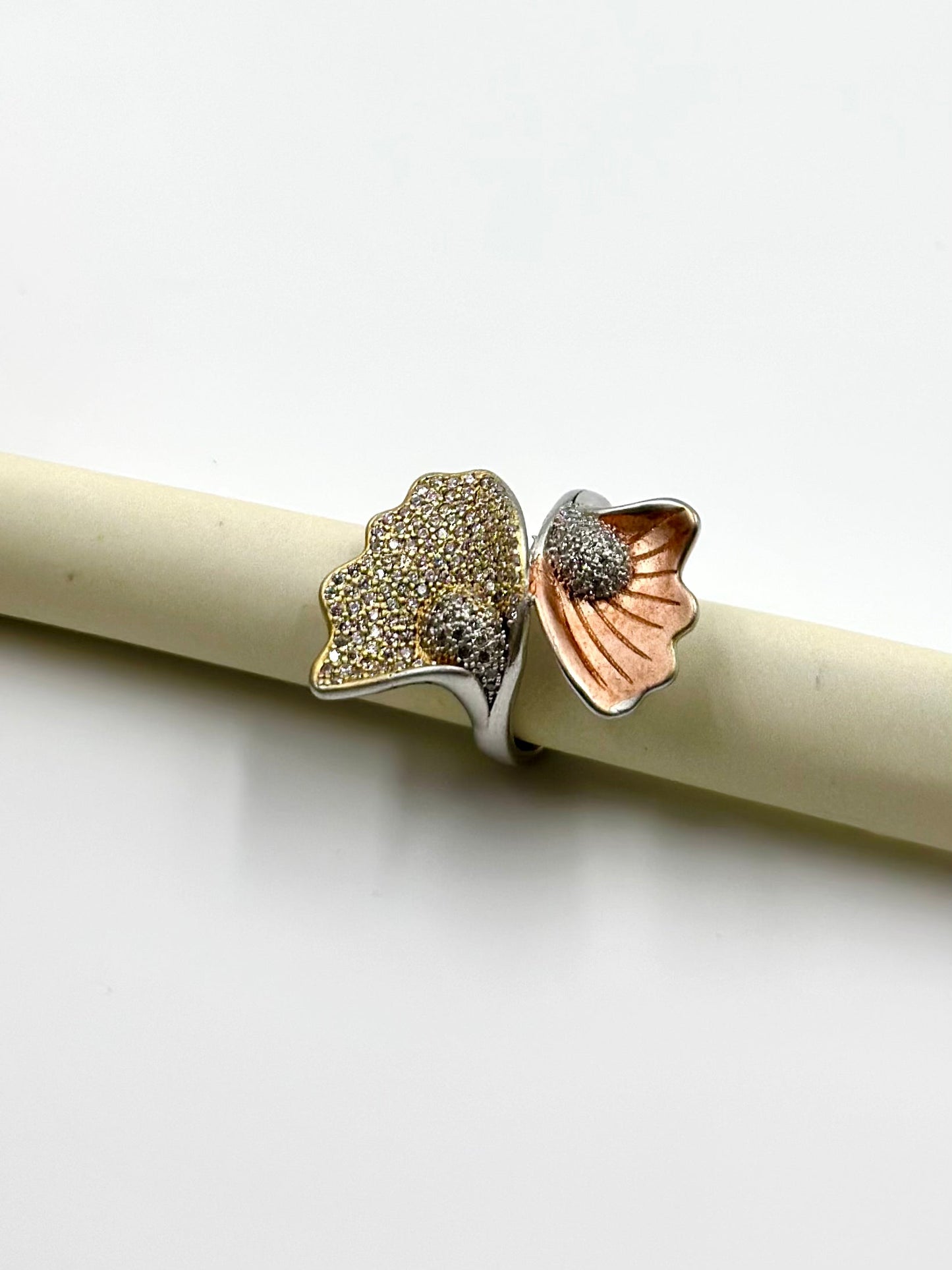 Zircon studded, wings shaped sterling silver cocktail ring 