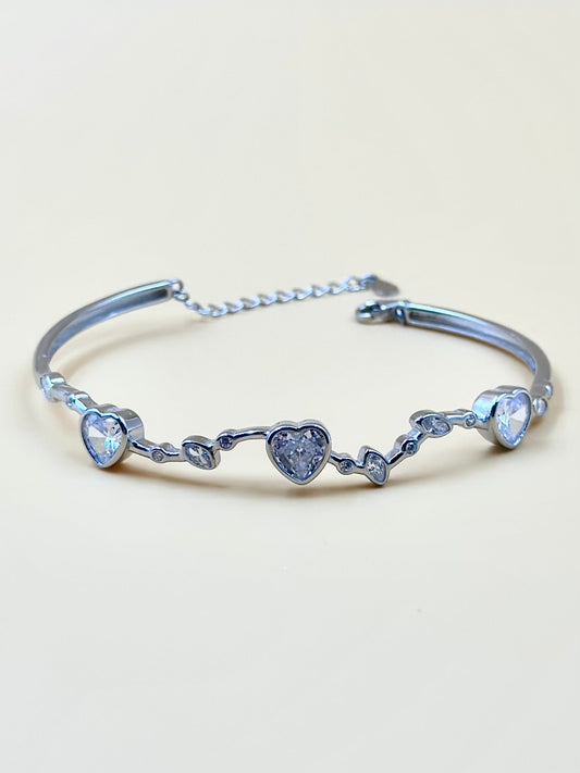 Heart shaped stones studded sterling silver cuff bracelet
