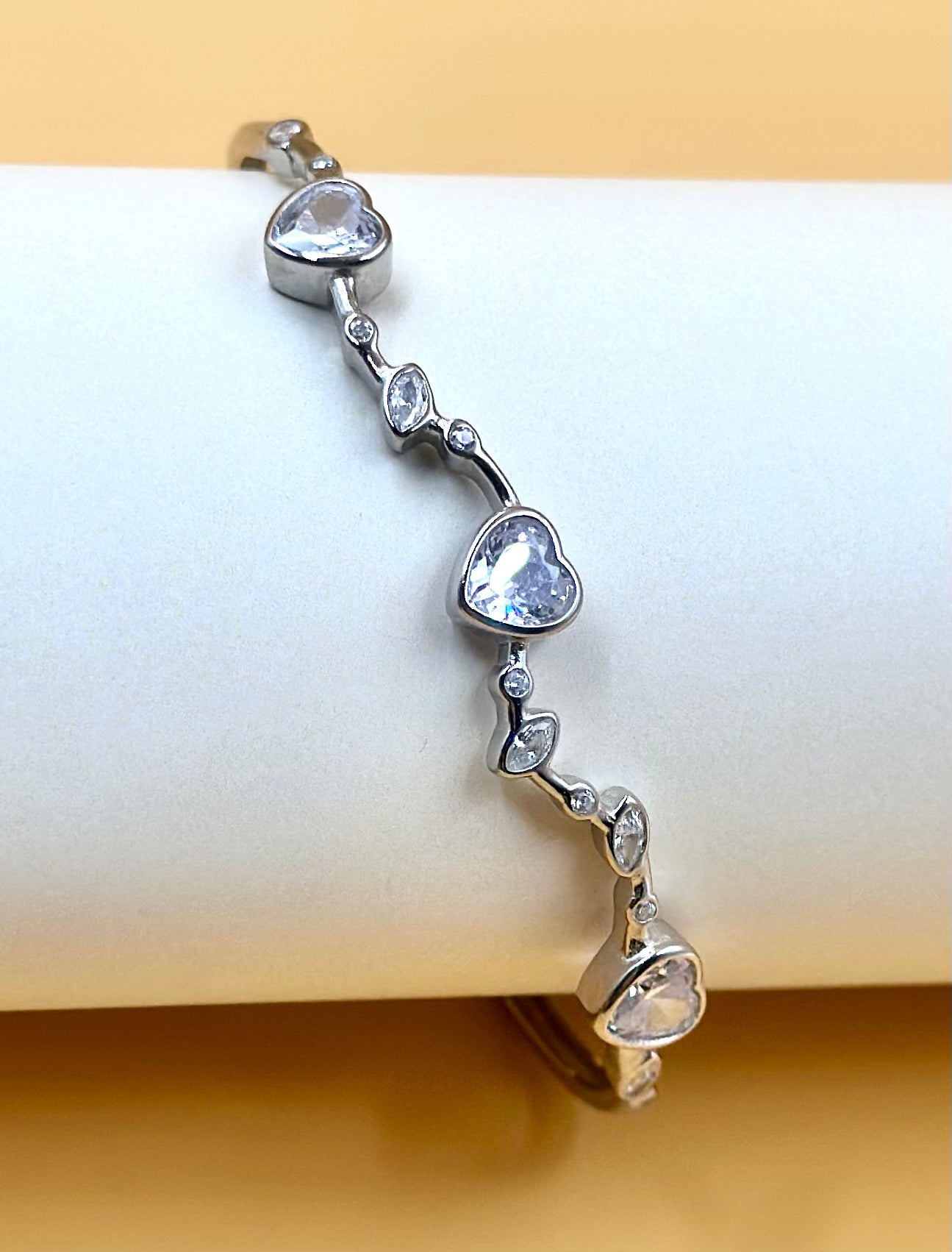 Heart shaped stones studded sterling silver cuff bracelet