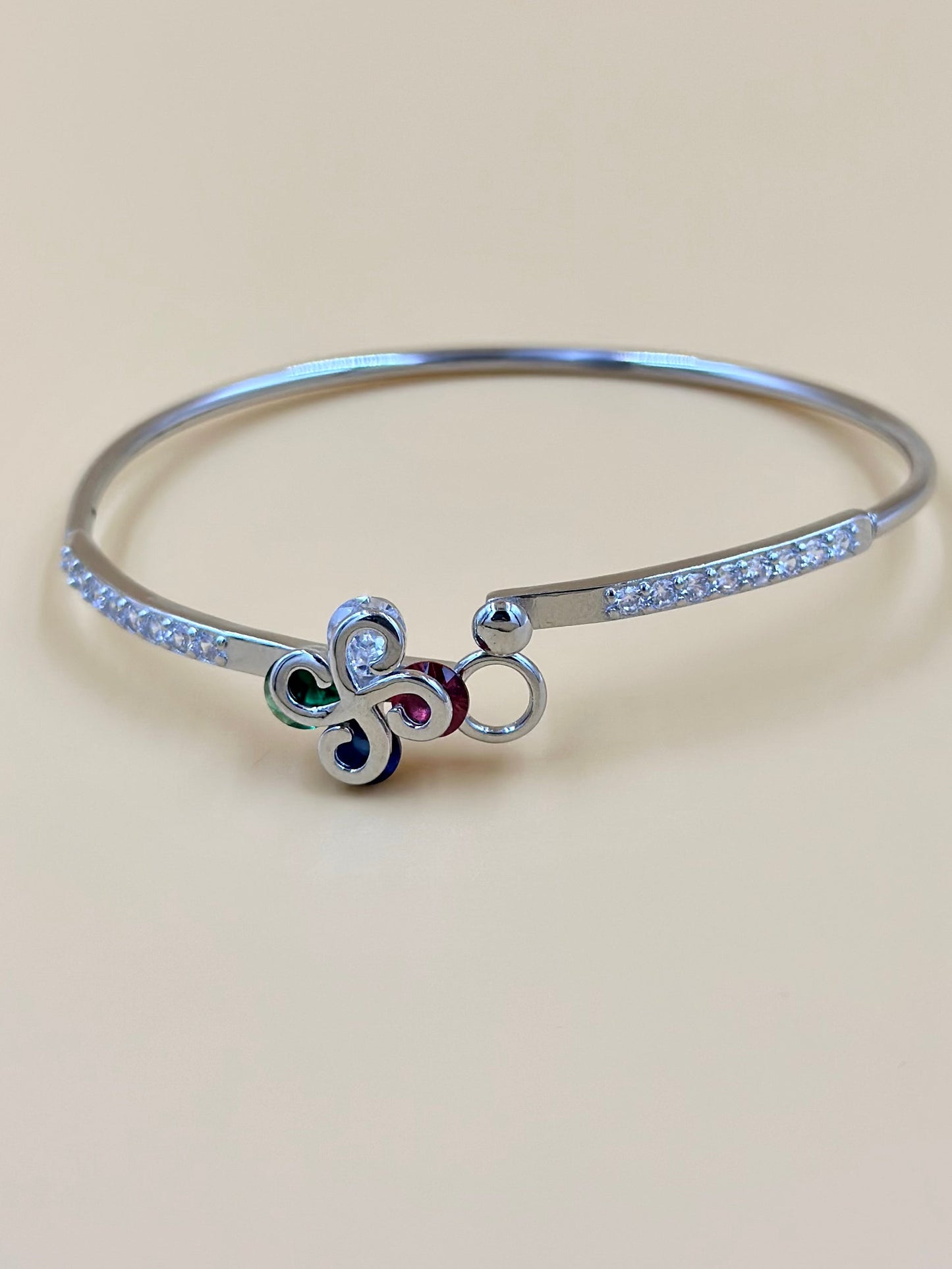 Zircon studded, flower shaped sterling silver cuff bracelet