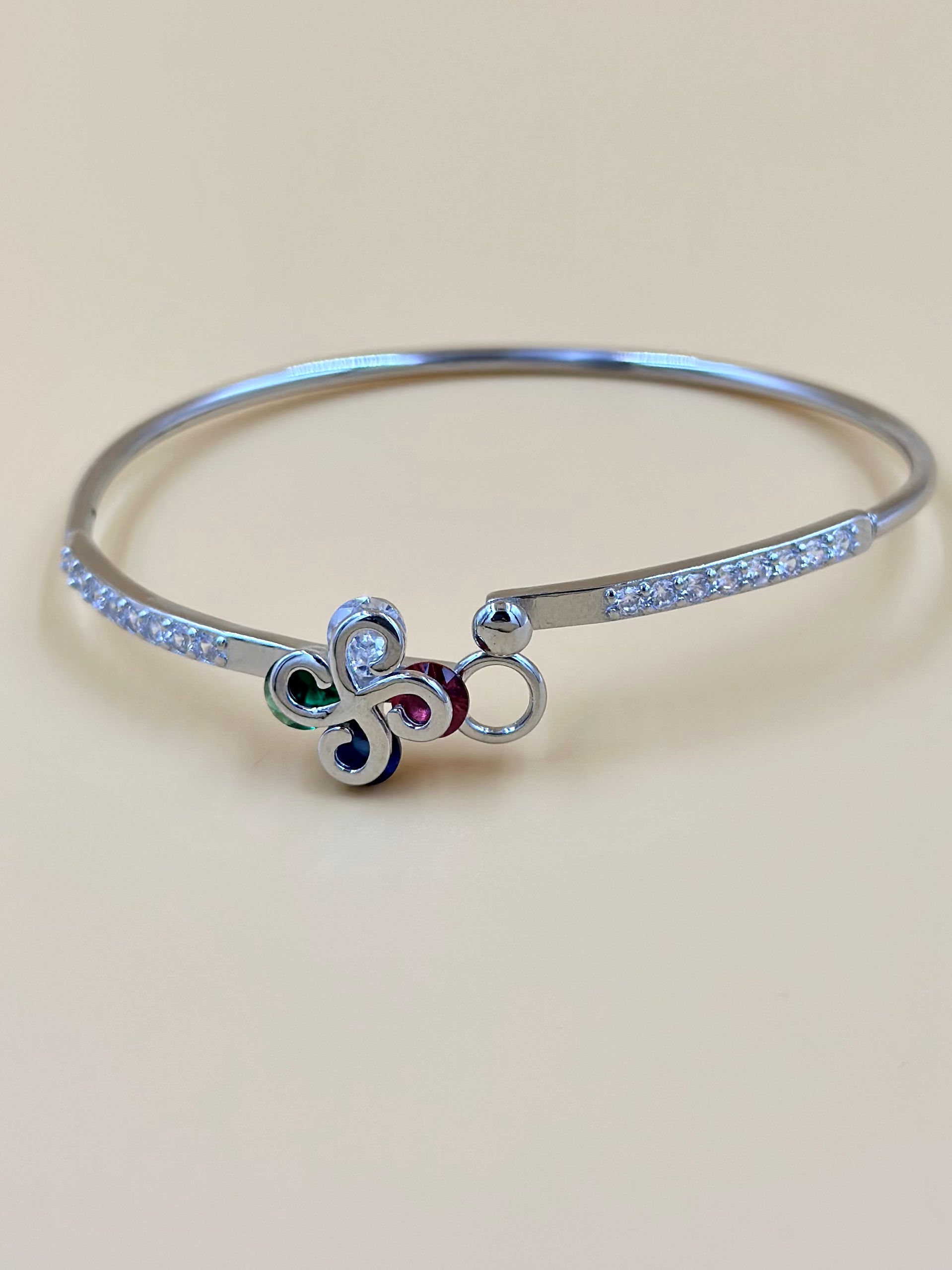 Zircon studded, flower shaped sterling silver cuff bracelet