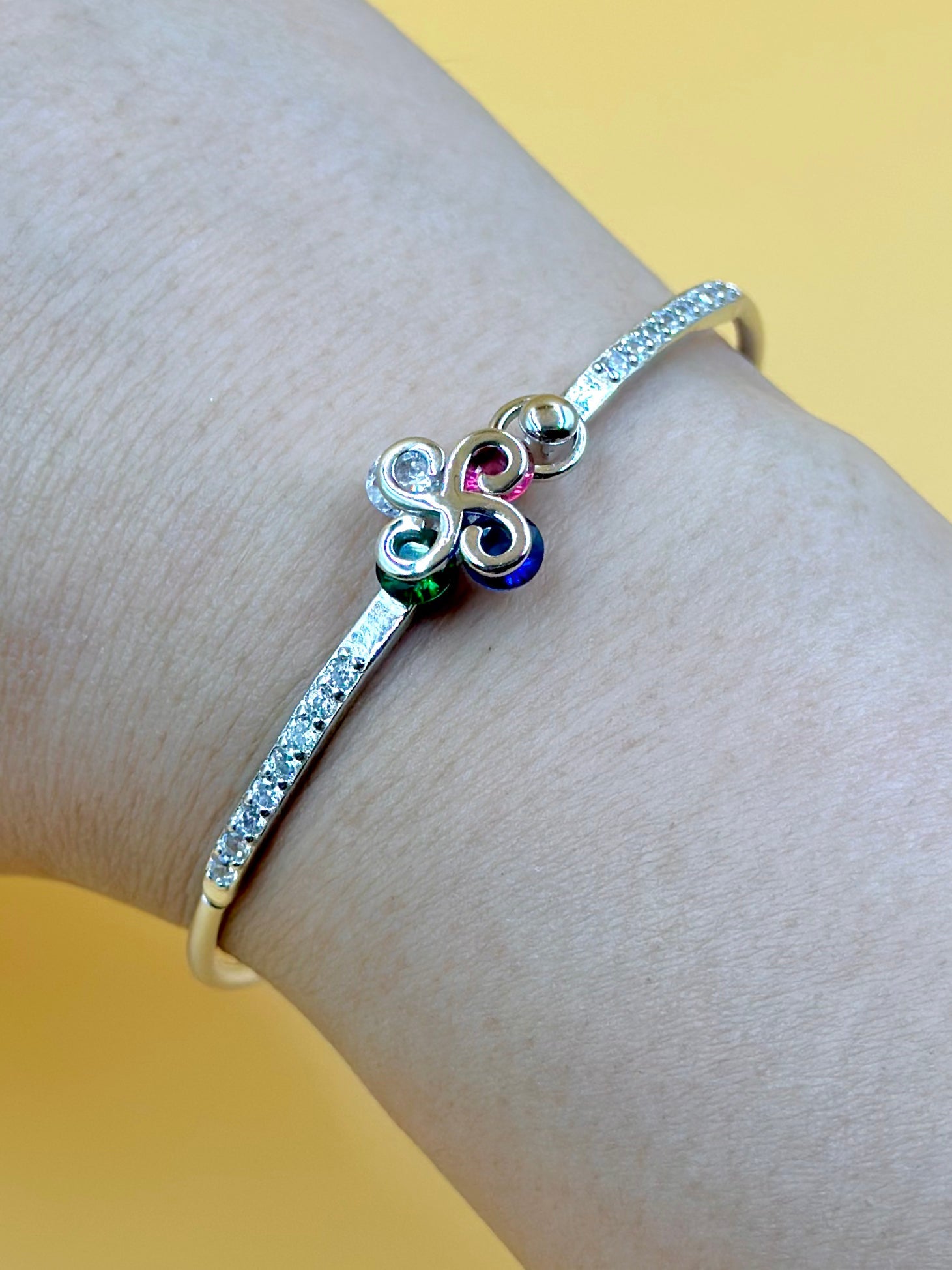 Zircon studded, flower shaped sterling silver cuff bracelet