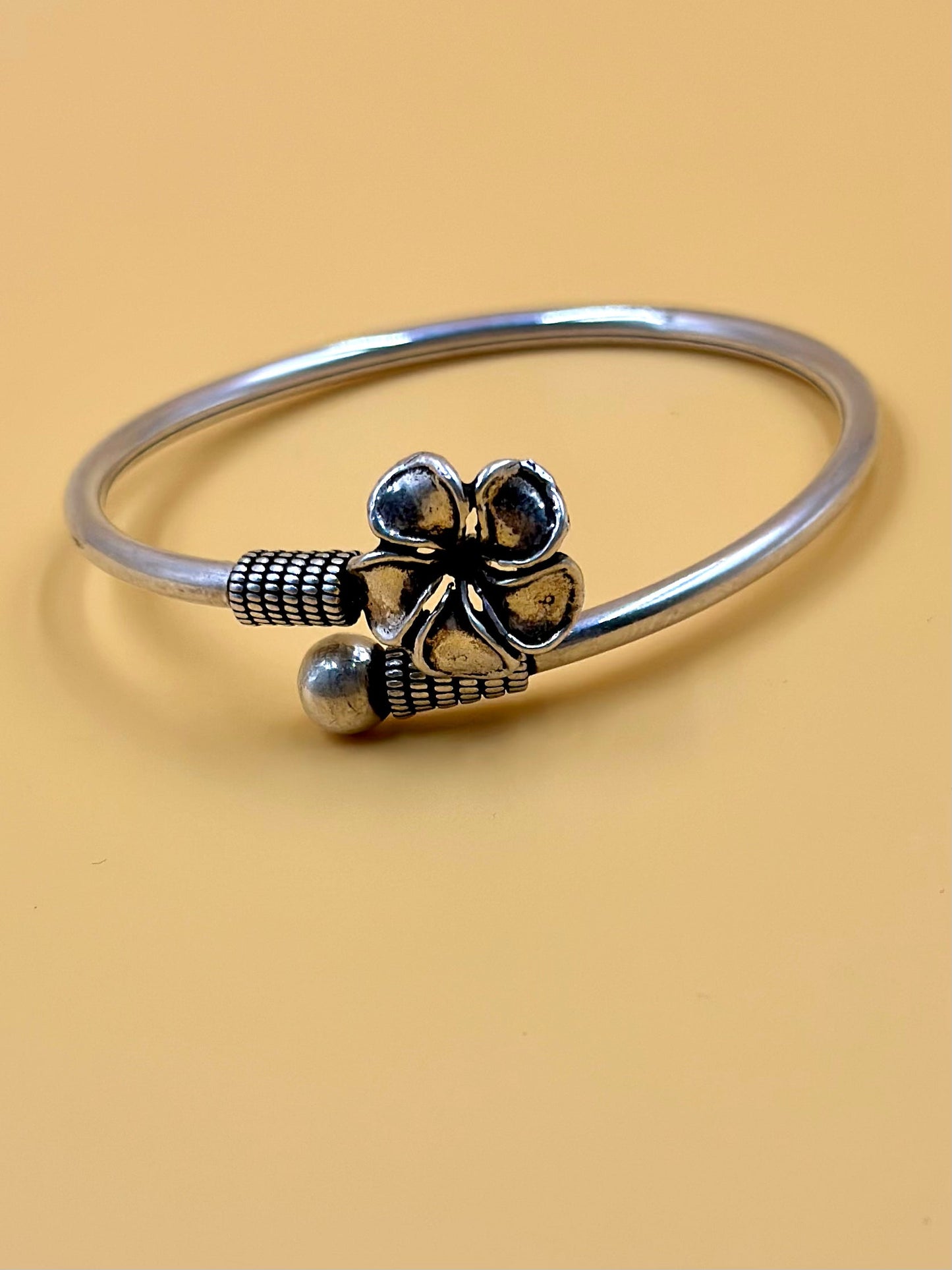 Flower shaped sterling silver cuff bracelet