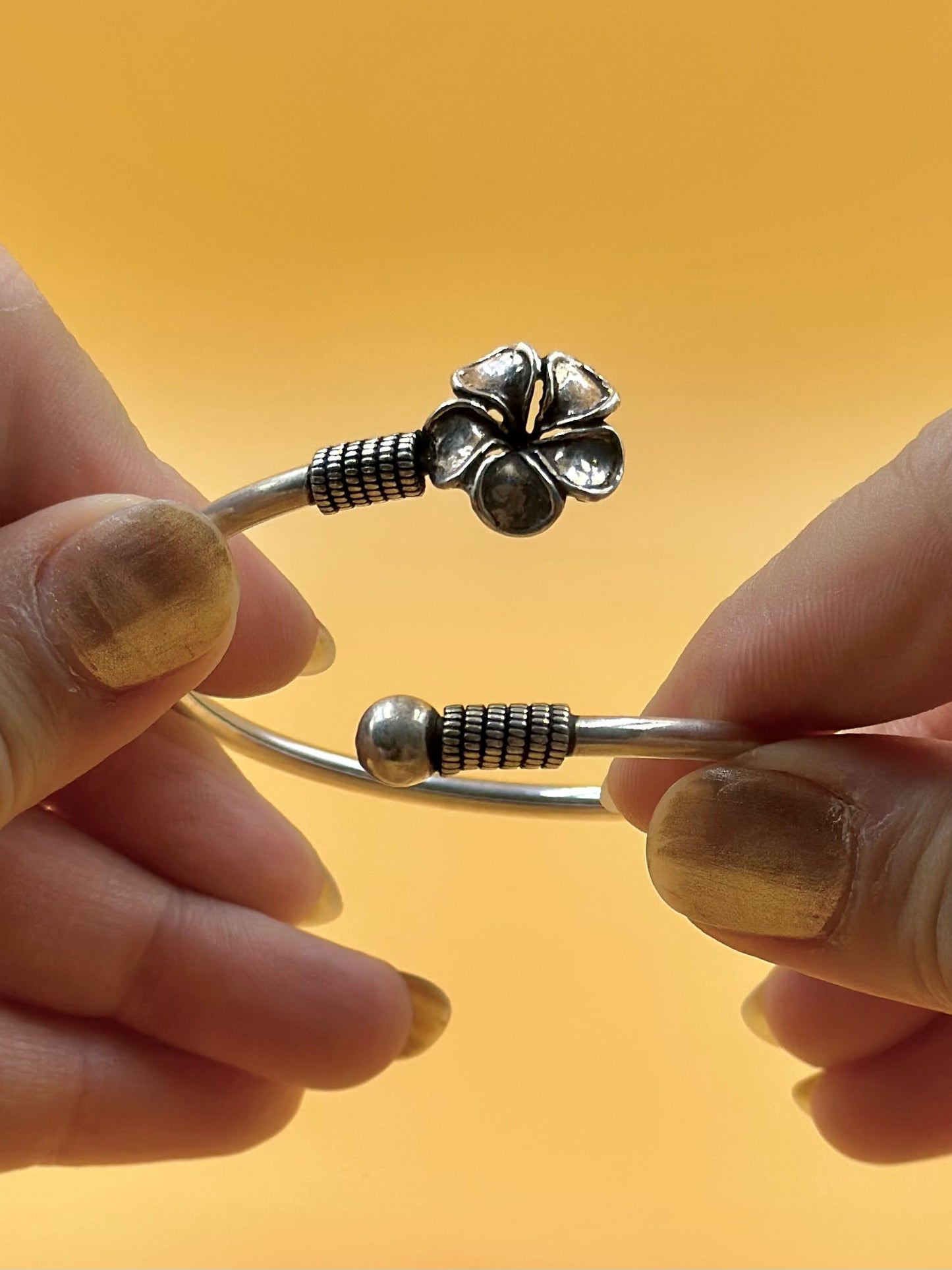 Flower shaped sterling silver cuff bracelet