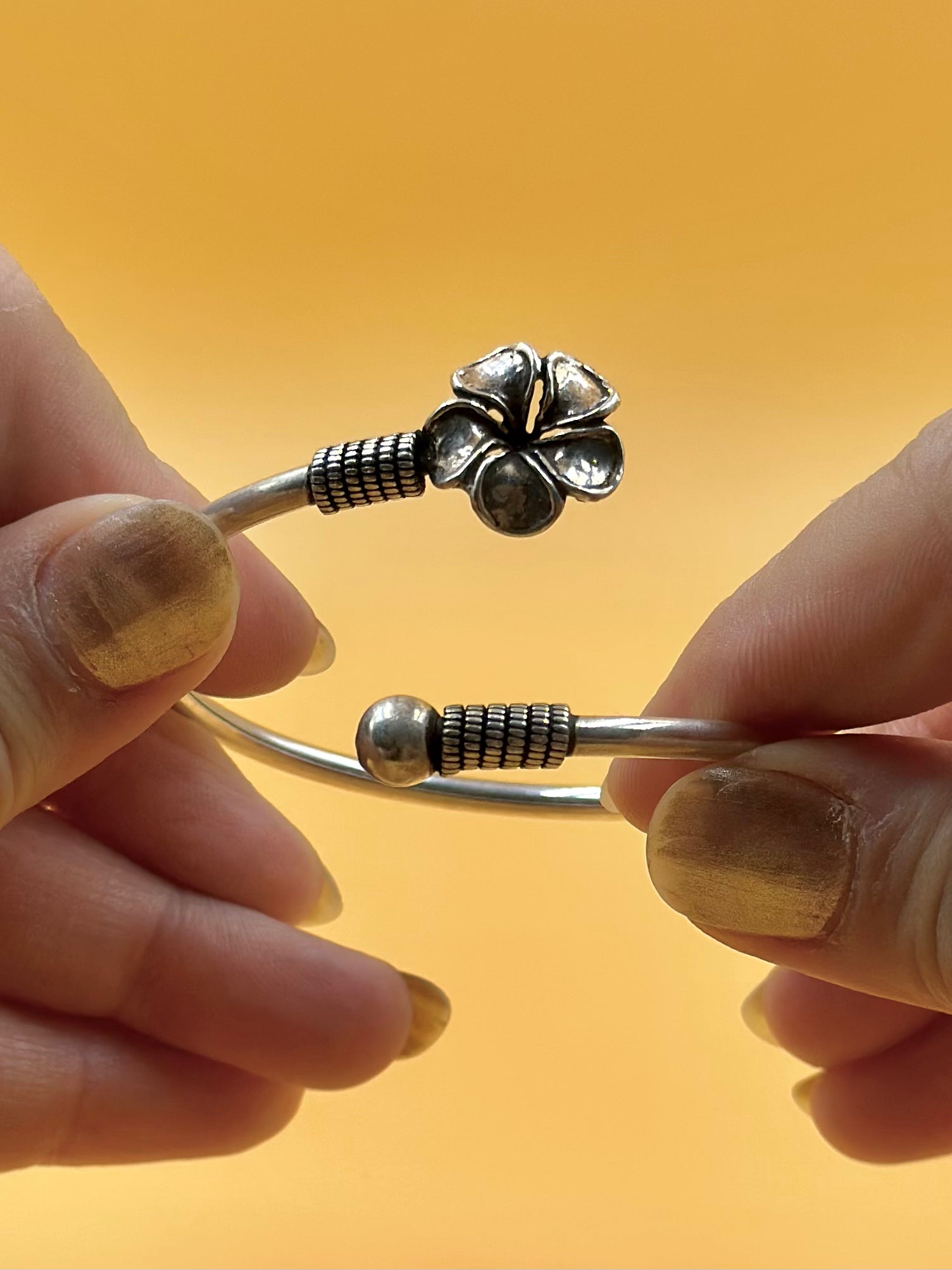 Flower shaped sterling silver cuff bracelet