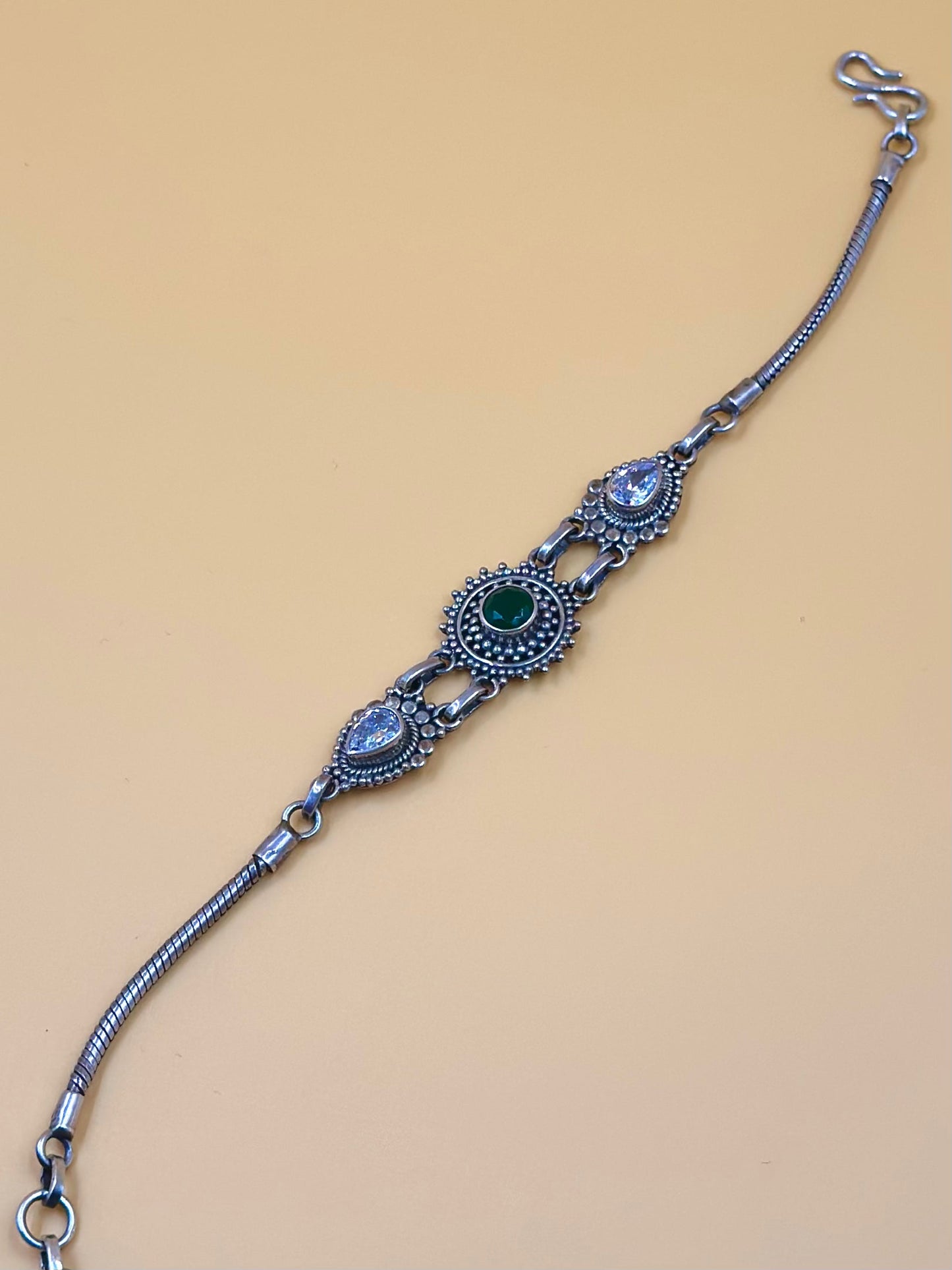 Oxidised, enamel coated, flower shaped sterling silver link bracelet