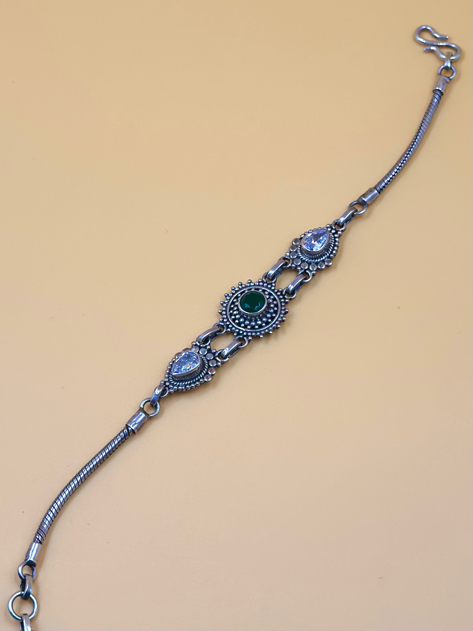 Oxidised, enamel coated, flower shaped sterling silver link bracelet