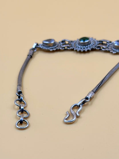 Oxidised, enamel coated, flower shaped sterling silver link bracelet