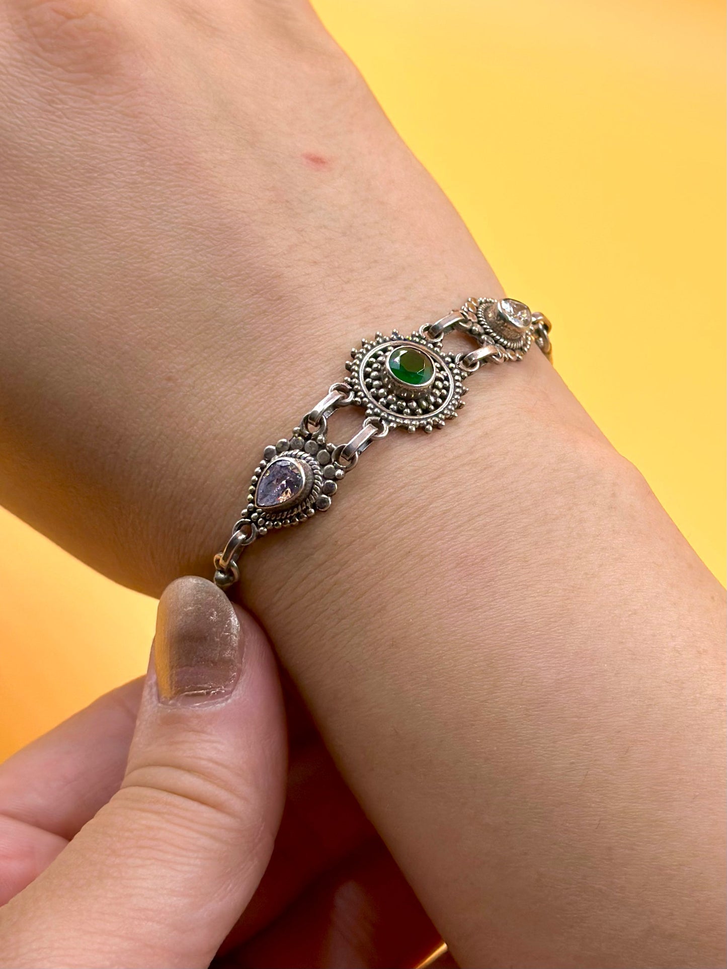 Oxidised, enamel coated, flower shaped sterling silver link bracelet