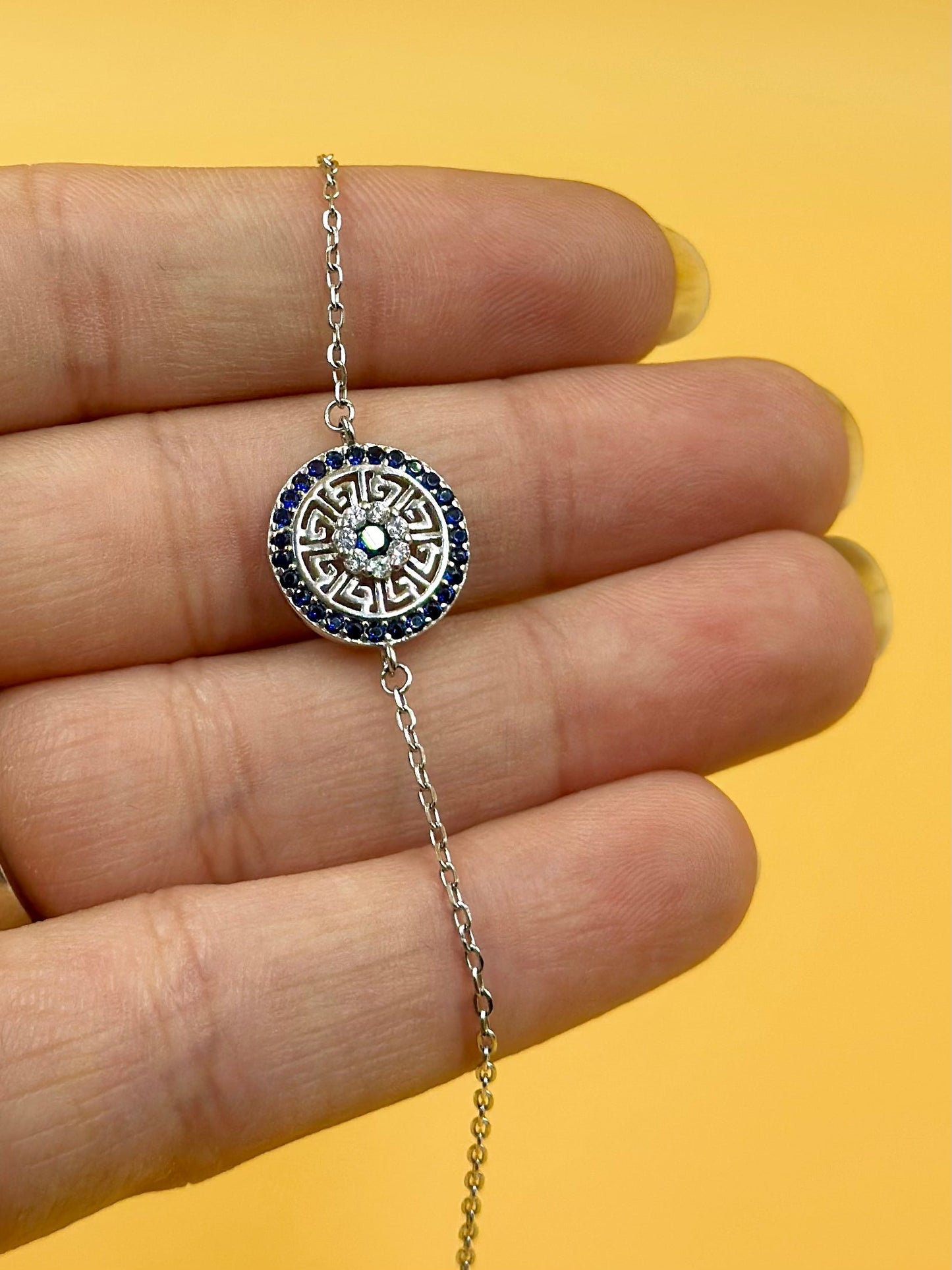 Stones and zircon studded, fine detailing sterling silver link bracelet