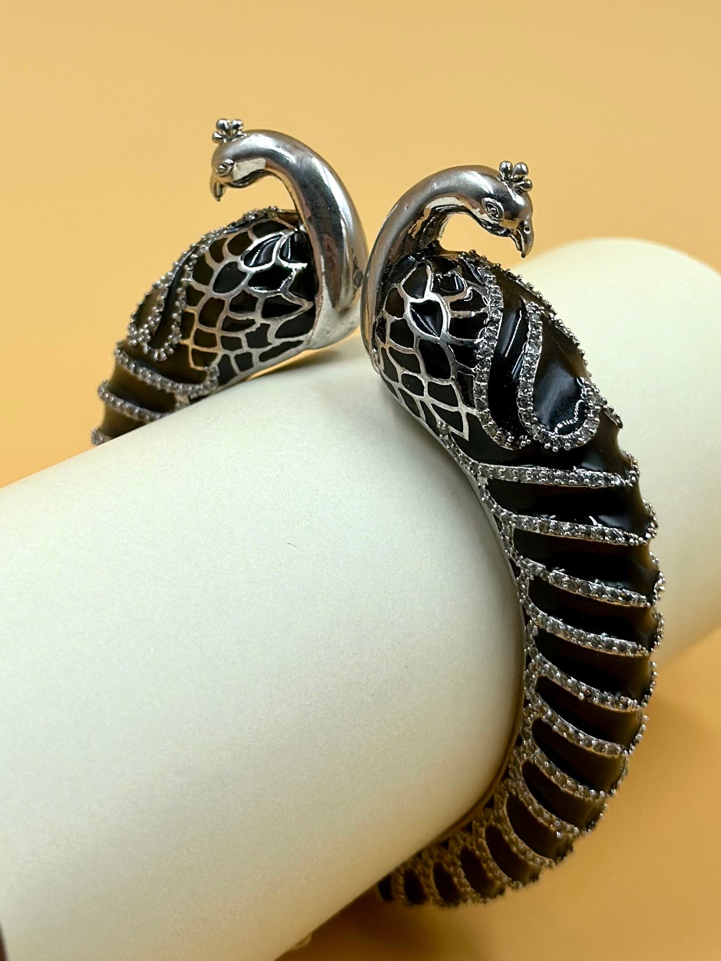 Zircon studded, peacock shaped sterling silver cuff bracelet