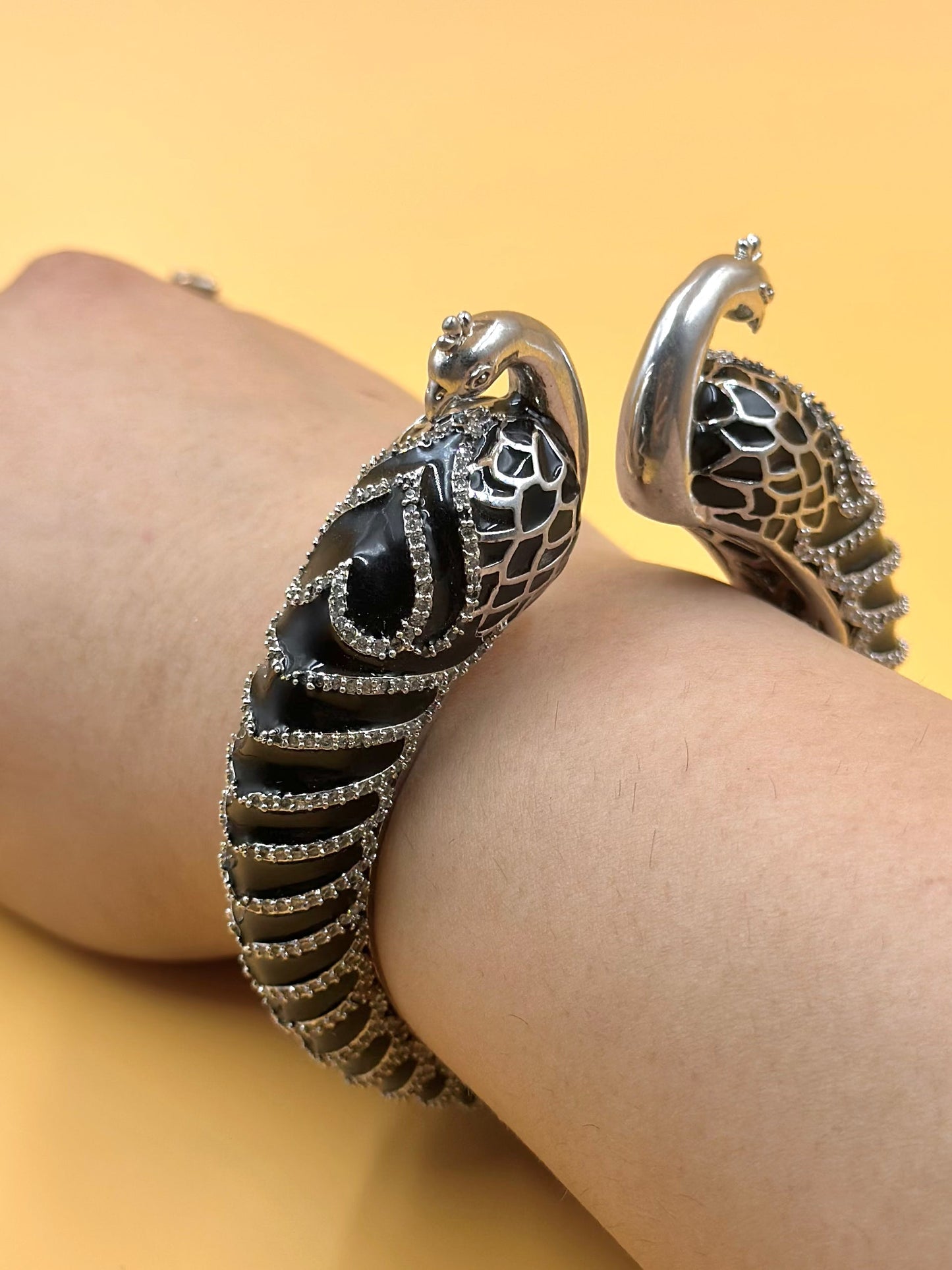 Zircon studded, peacock shaped sterling silver cuff bracelet