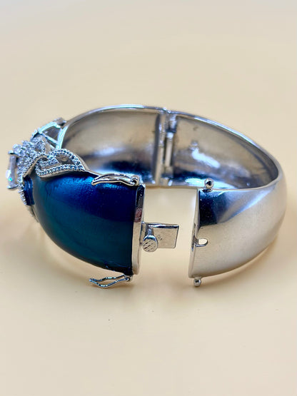 Zircon and a stone studded, flower design sterling silver cuff bracelet