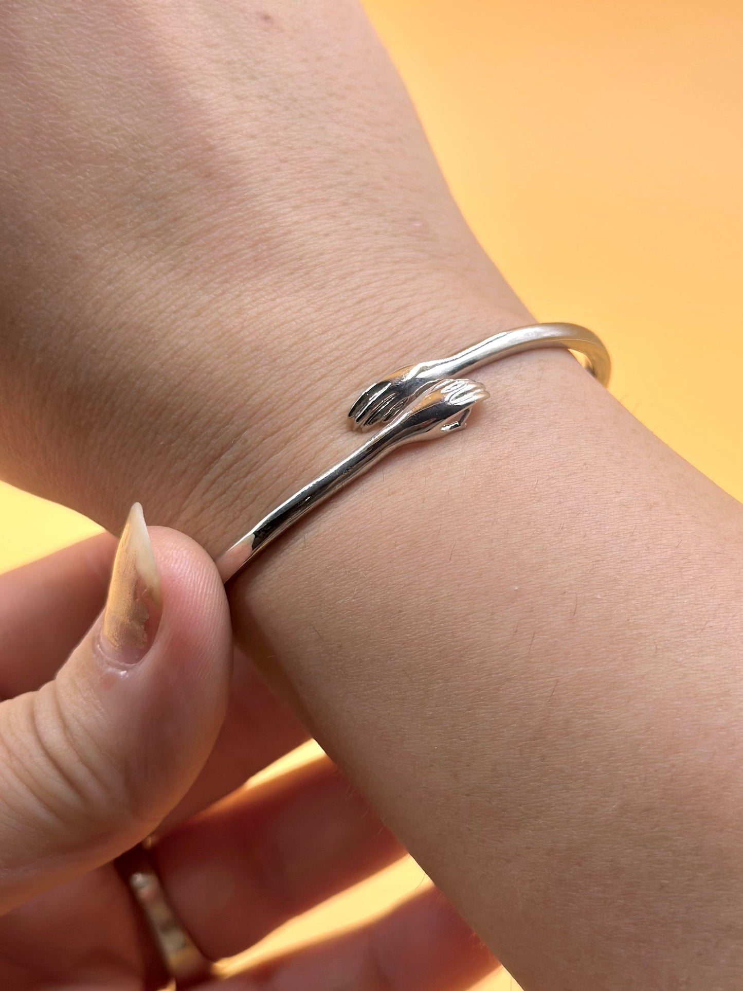 Hug design sterling silver cuff bracelet