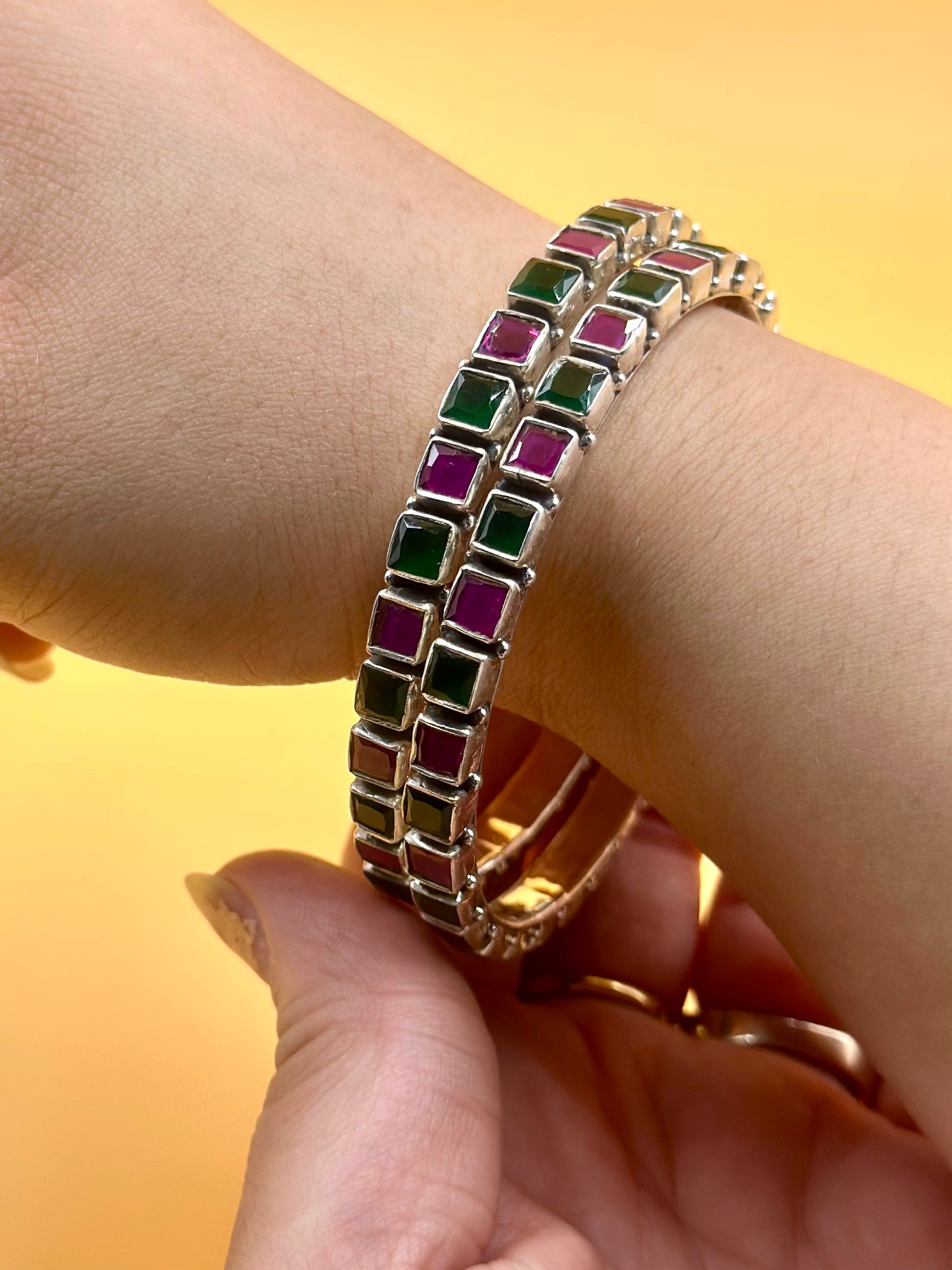 Square-cut gemstones studded sterling silver bangle