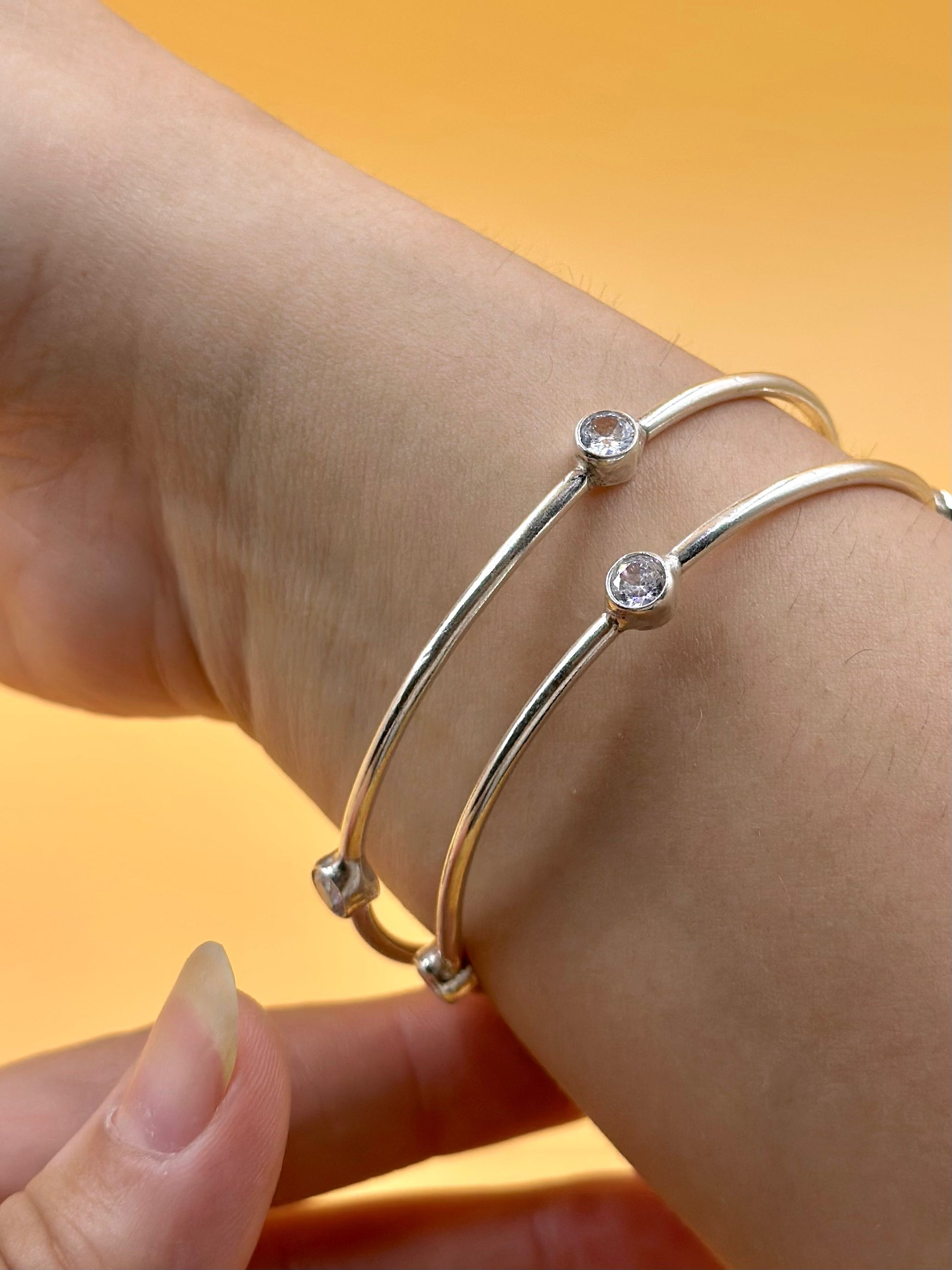 Stones studded sterling silver bangle