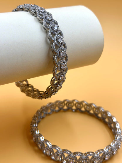 Zircon studded, circular pattern sterling silver bangles