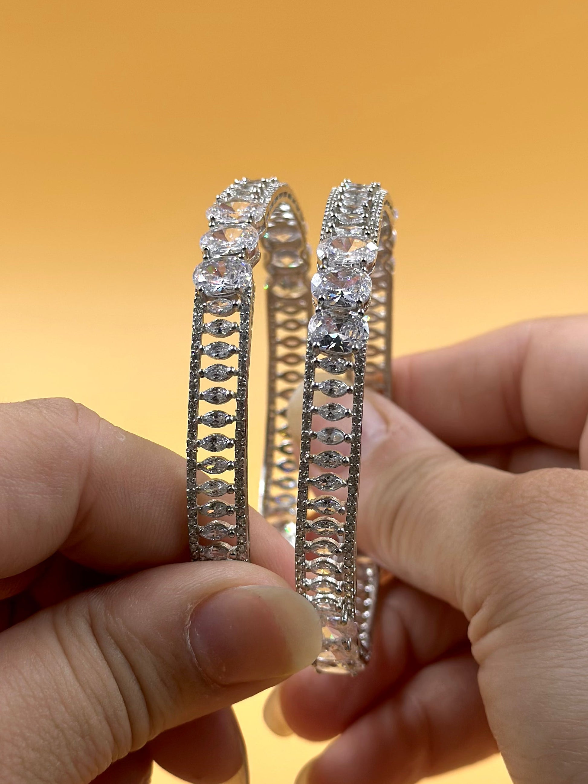 Zircon studded with fine detailing sterling silver bangle