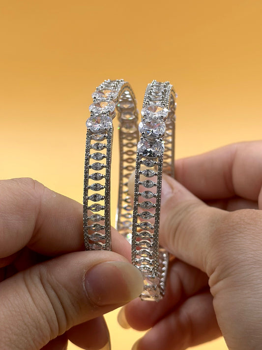 Zircon studded with fine detailing sterling silver bangle