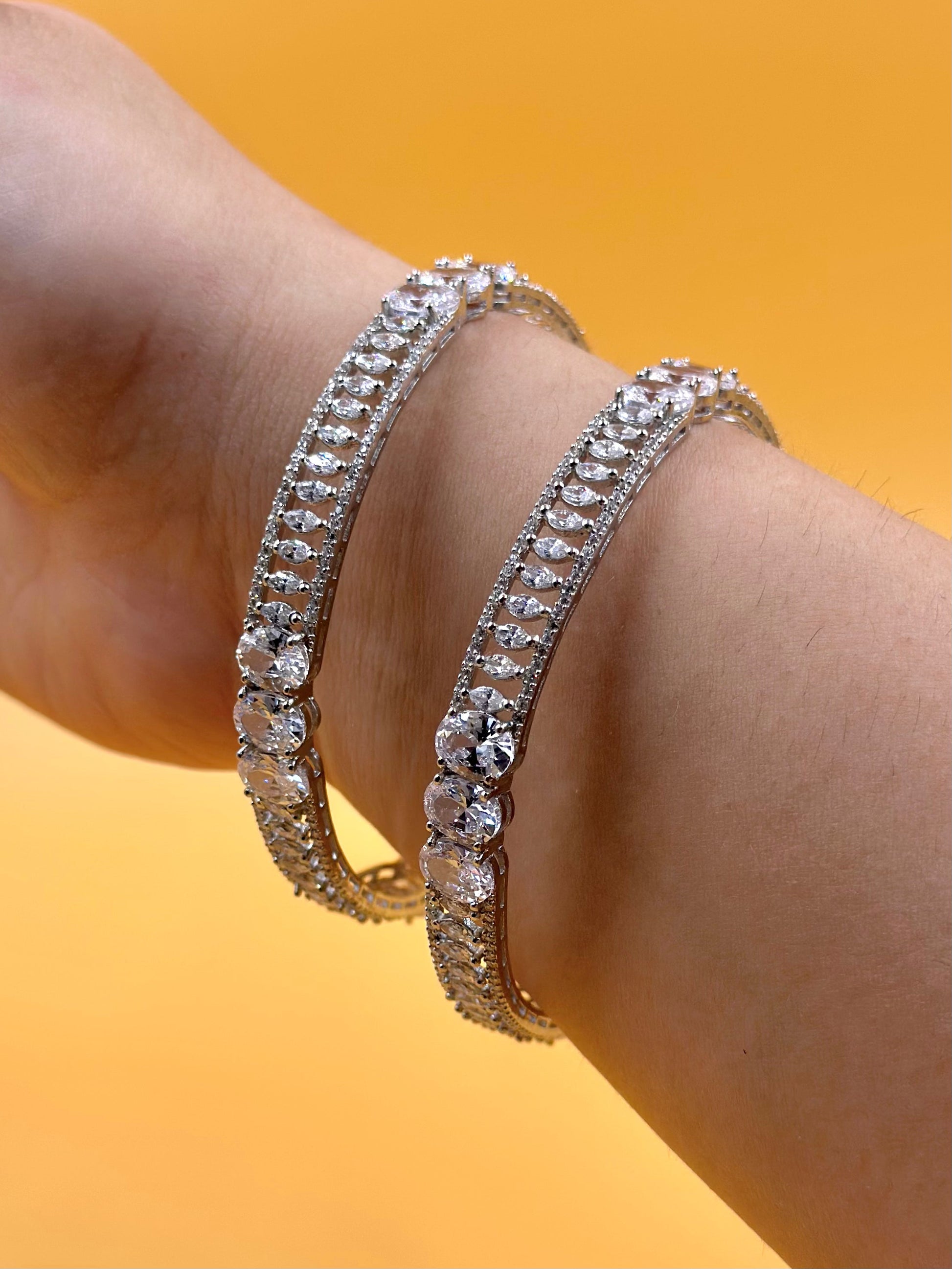 Zircon studded with fine detailing sterling silver bangle