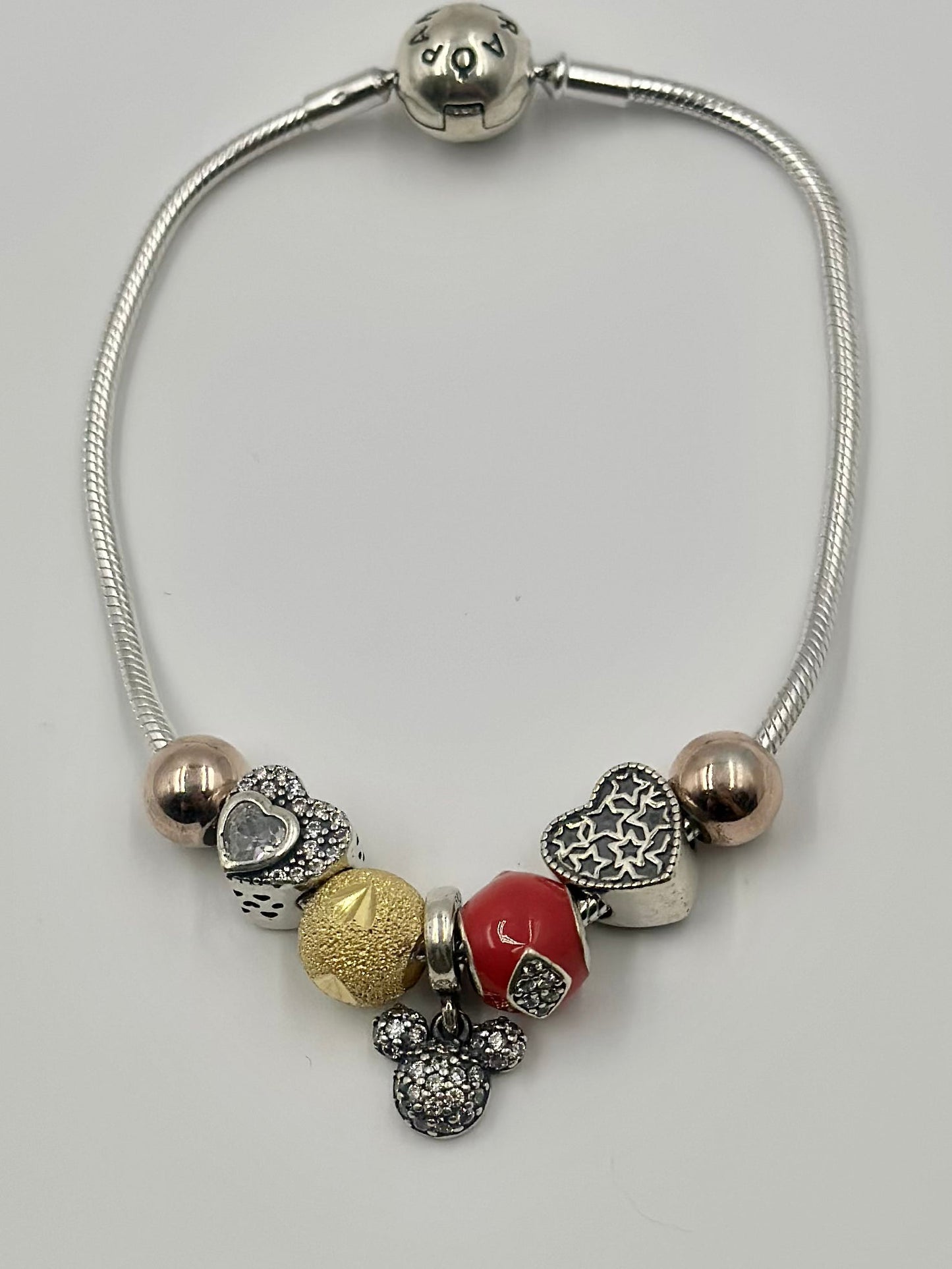 Zircon studded, heart-micky-circle shaped charms sterling silver charm bracelet