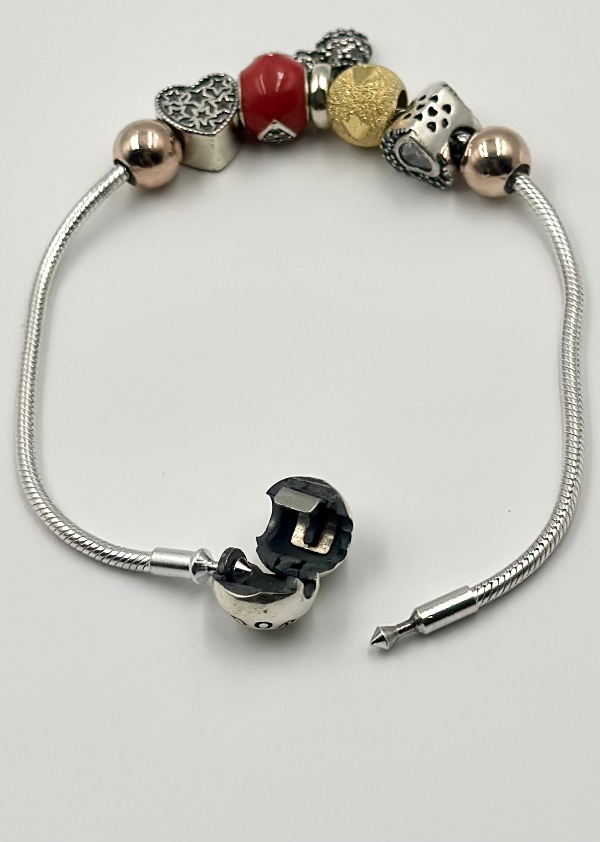 Zircon studded, heart-micky-circle shaped charms sterling silver charm bracelet