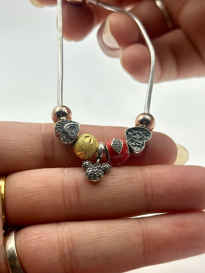 Zircon studded, heart-micky-circle shaped charms sterling silver charm bracelet