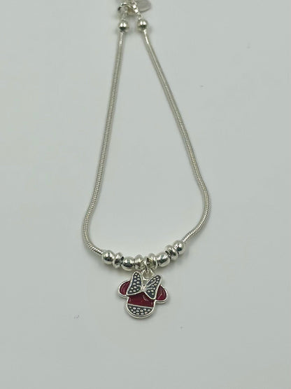 Oxidised, enamel coated sterling silver charm bracelet