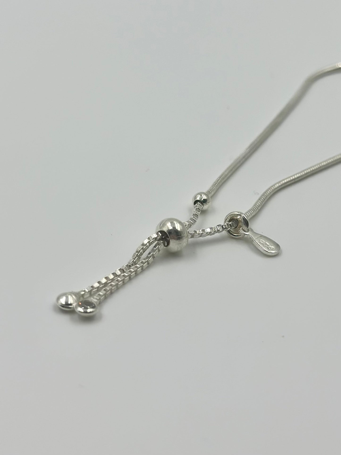 Oxidised, enamel coated sterling silver charm bracelet