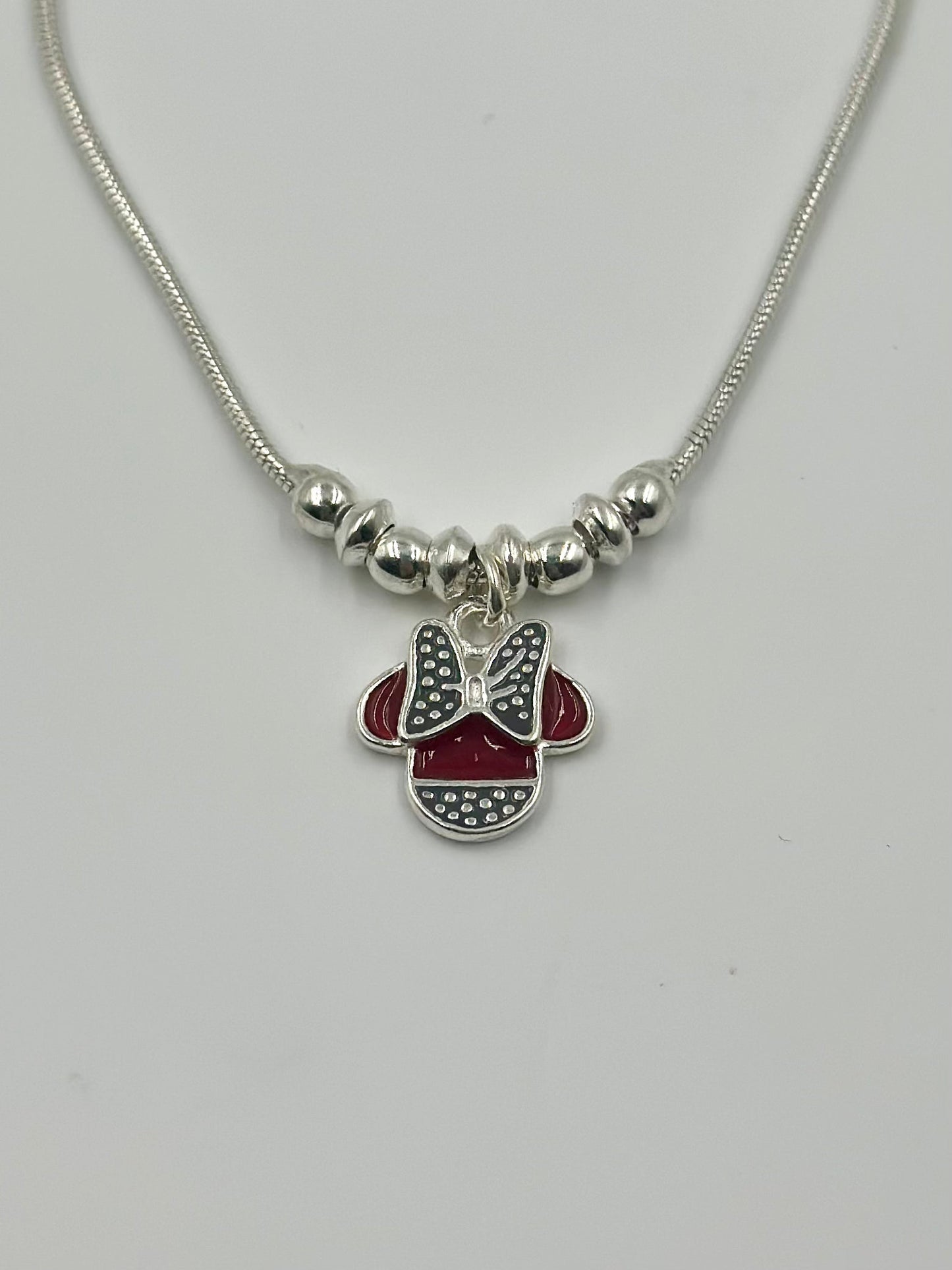 Oxidised, enamel coated sterling silver charm bracelet