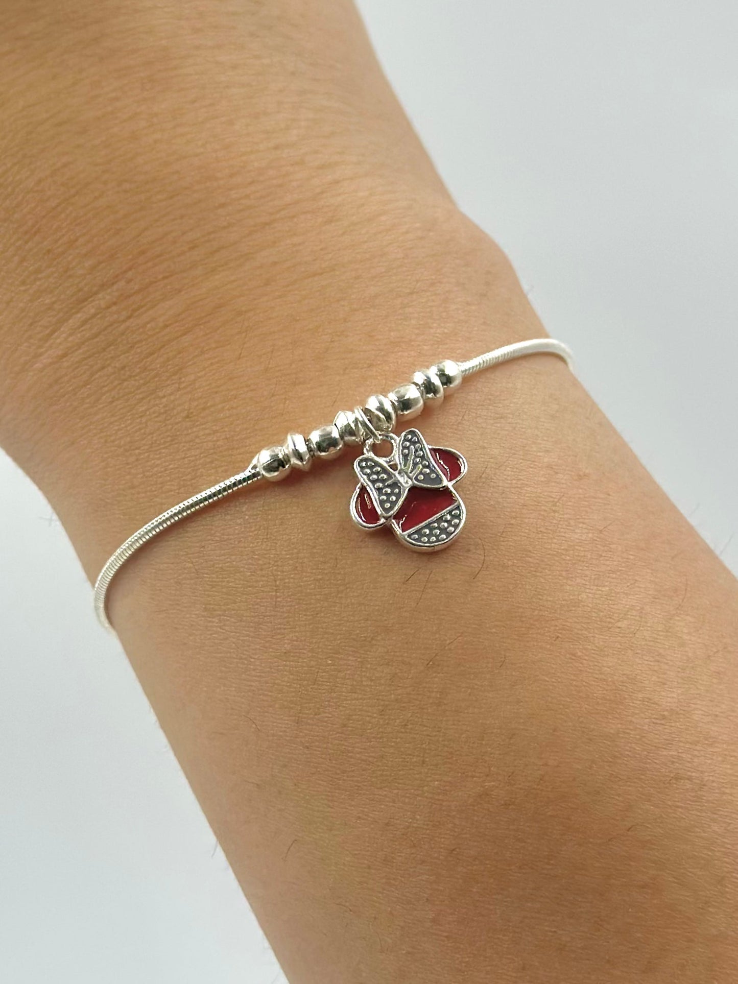 Oxidised, enamel coated sterling silver charm bracelet