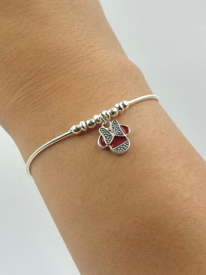 Oxidised, enamel coated sterling silver charm bracelet