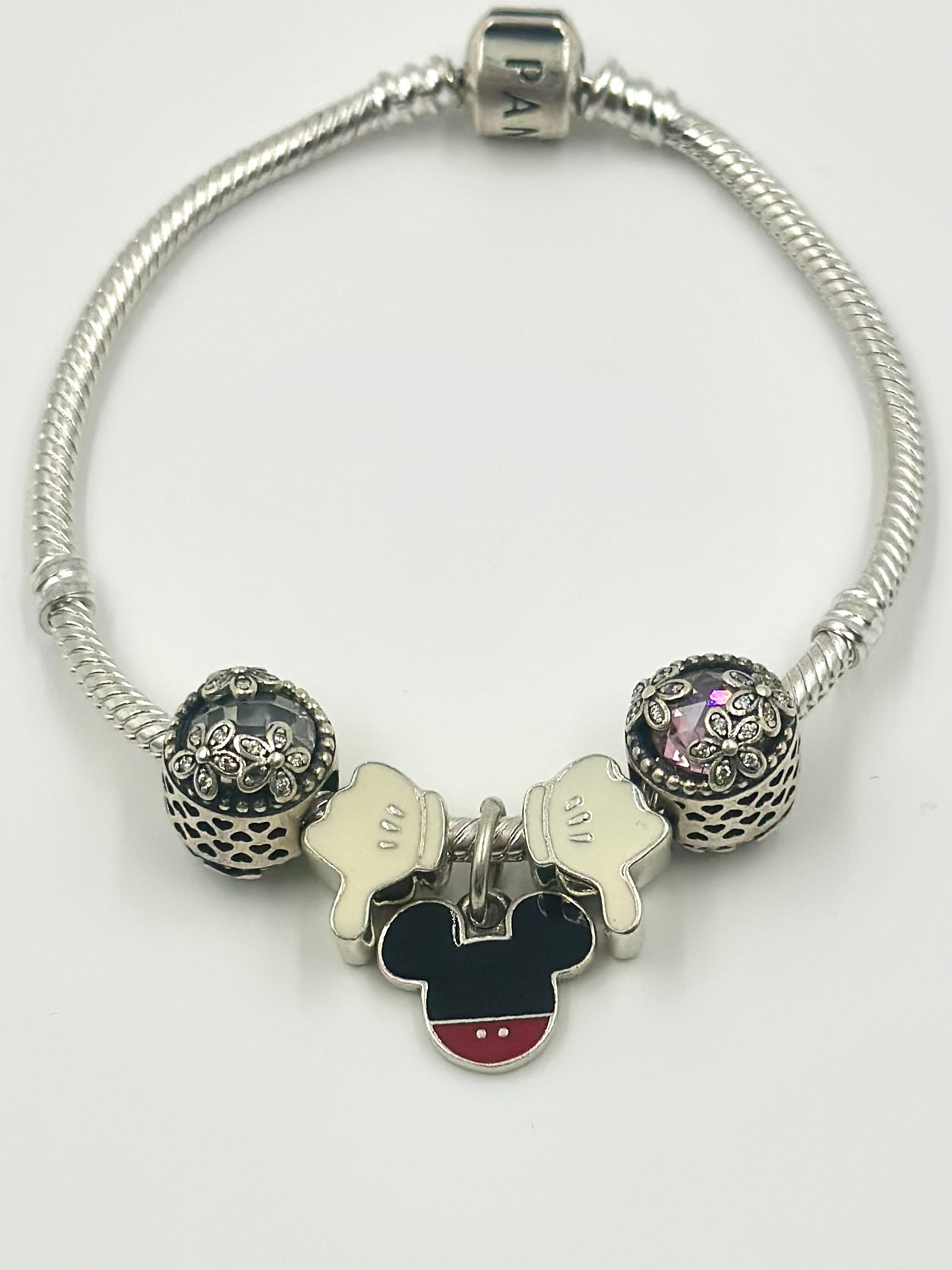 Oxidised, zircon studded, enamel coated sterling silver charm bracelet