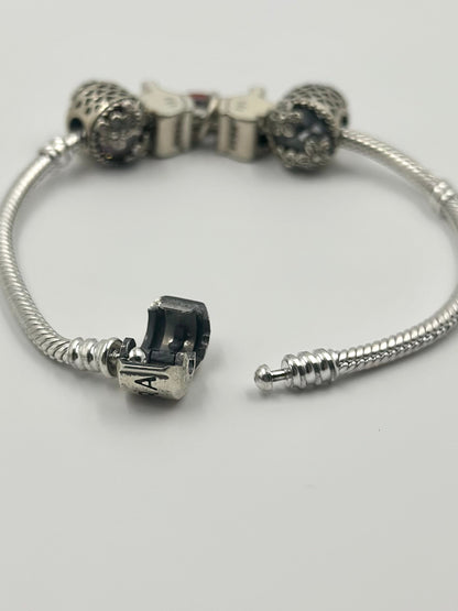Oxidised, zircon studded, enamel coated sterling silver charm bracelet