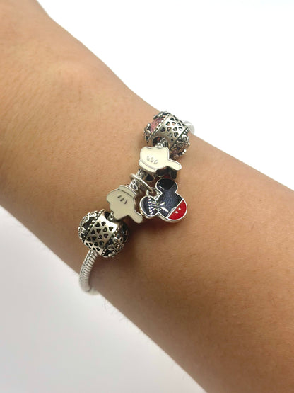 Oxidised, zircon studded, enamel coated sterling silver charm bracelet
