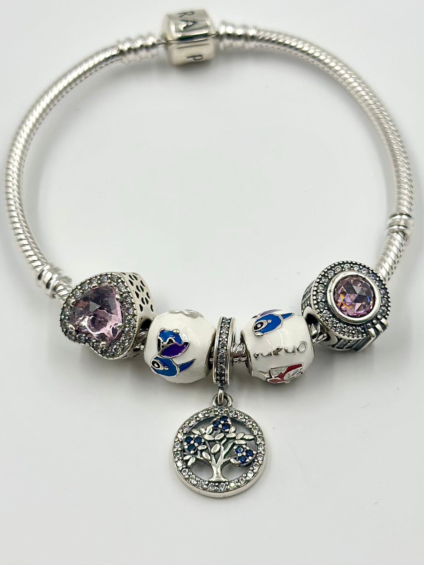 Stone and Zircon studded, enamel coated sterling silver charm bracelet