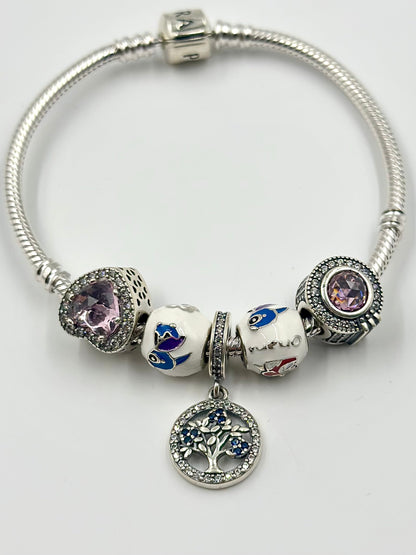 Stone and Zircon studded, enamel coated sterling silver charm bracelet