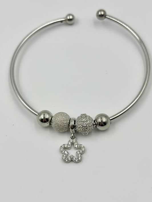 Zircon studded, star-circle shaped sterling silver charm bracelet