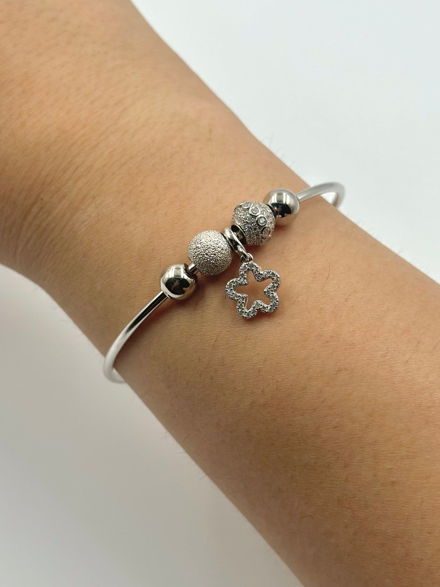 Zircon studded, star-circle shaped sterling silver charm bracelet